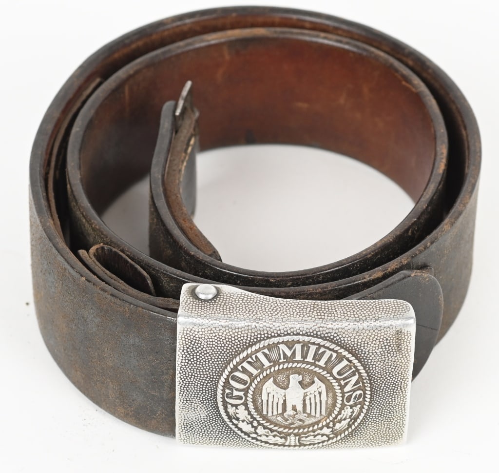 WWII NAZI GERMAN WEHRMACHT BELT & BUCKLE WW2: WEHRMACHT BELT & BELT BUCKLE. Early, injection molded, natural aluminum box buckle with a pebbled background field and a slightly domed, embossed central motif. The central motif features an embossed 