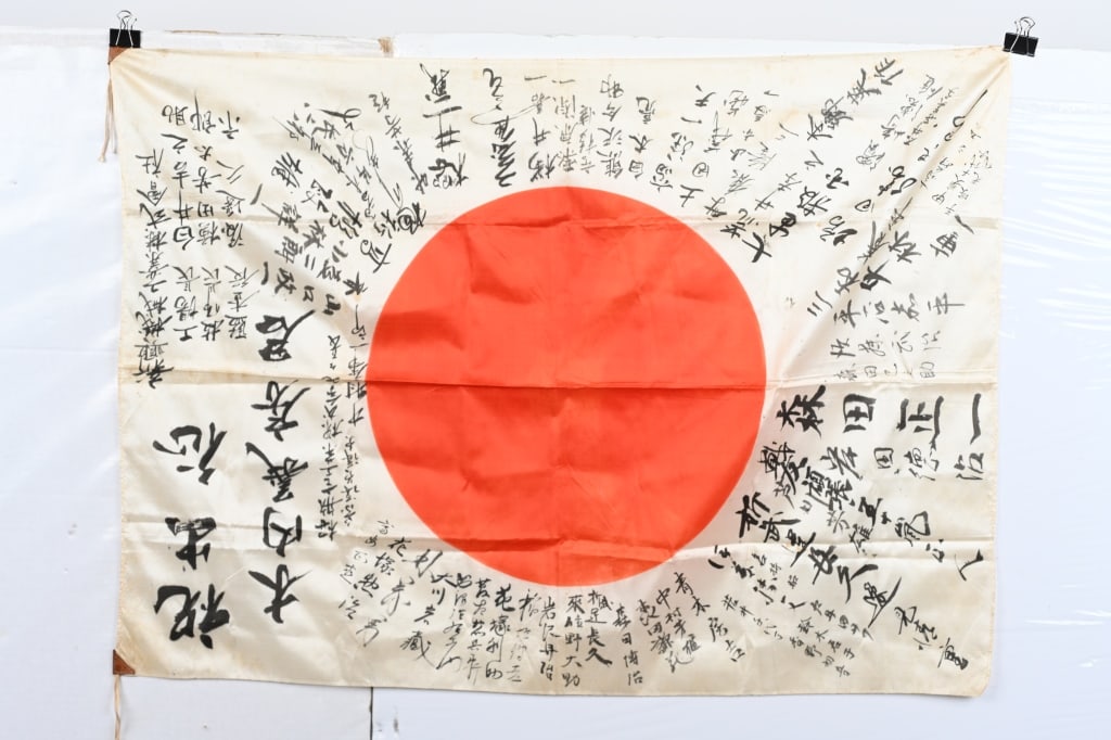 WWII JAPANESE ARMY SOLDIERS NATL. FLAG W/ KANJI: Large silk flag measuring 37" by 27". Large amount of Kanji, original ties to the corners. Excellent.