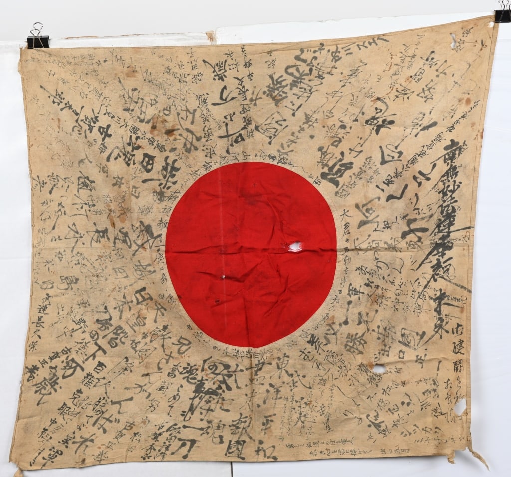 WWII JAPANESE ARMY SOLDIERS NATL. FLAG W/ KANJI: Large silk flag measuring 37" by 27". Large amount of Kanji, original ties to the corners. Excellent with a couple of small holes.