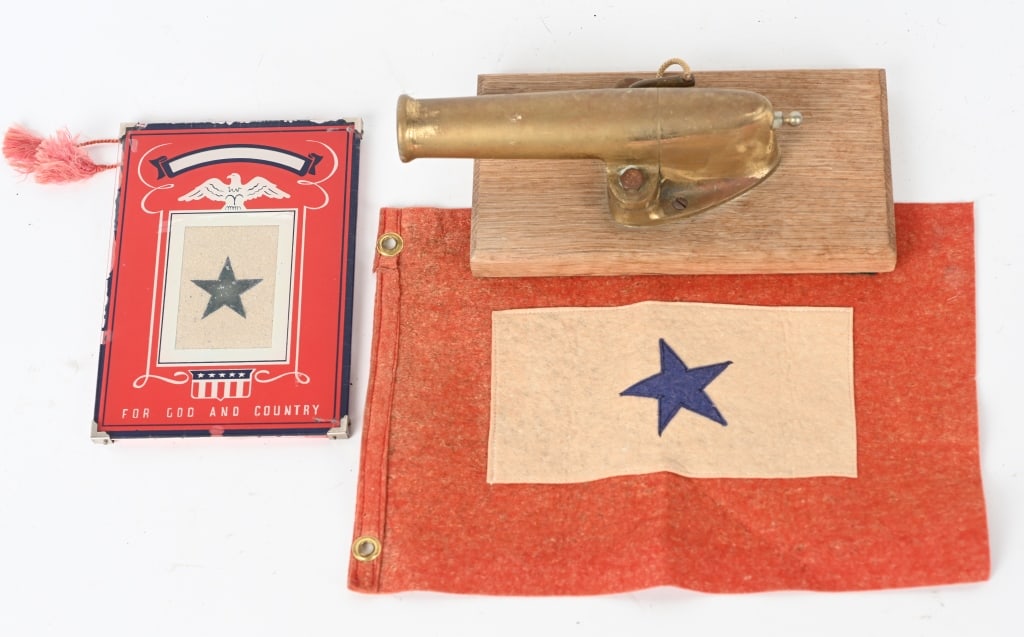 WW2 SON IN SERVICE FLAG LOT 12 GAUGE SIGNAL CANNON: Lot of military items to include 1) Small 12 gauge brass signal cannon measuring 7 1/4 inches 2) Small felt Son in Service flag measuring 8 1/2 X 11 3/4 in excellent condition. 3) Small glass framed S