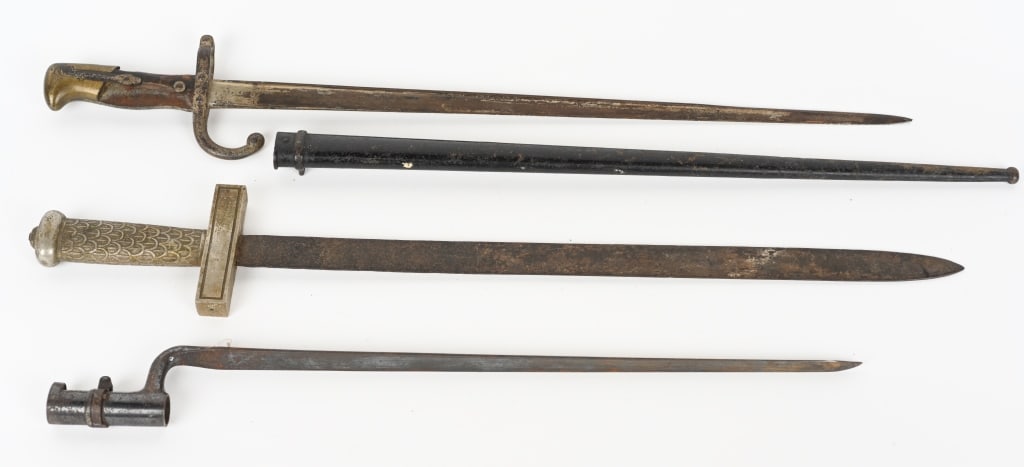 LOT OF BAYONETS SIDEARM FRENCH GRAS US TRAPDOOR: Lot of three edged weapons to include 1) Lodge Short Sword measuring 26 inches in total length with a 20 inch wide double edged blade. Grip is made of nickel brass and in good condition. 2) Frenc