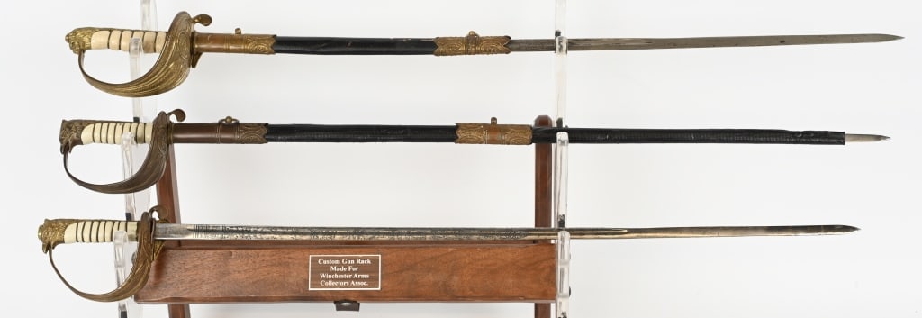 WWII ITALIAN NAVY OFFICER SWORD LOT WW2: Lot of three Italian Navy Officers sword to include 1) WWII ITALIAN NAVY LIONS HEAD SWORD W/ PARTIAL SCABBARD. WWII Italian Navy Lions head sword with original scabbard. Sword has a brass gu
