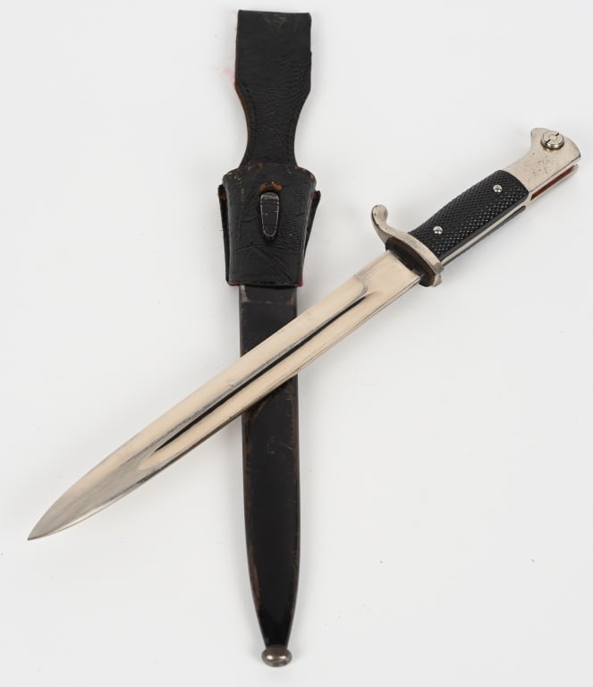 WWII NAZI GERMAN DRESS BAYONET BY CARL KREBS WW2: WWII NAZI GERMAN CARL JULIUS KREBS k98 DRESS BAYONET & SCABBARD. Marked Carl Julius Krebs at the ricasso. 9.8" blade with a 1.8" false edge, 14.6" overall length. Has black composite grips and black p