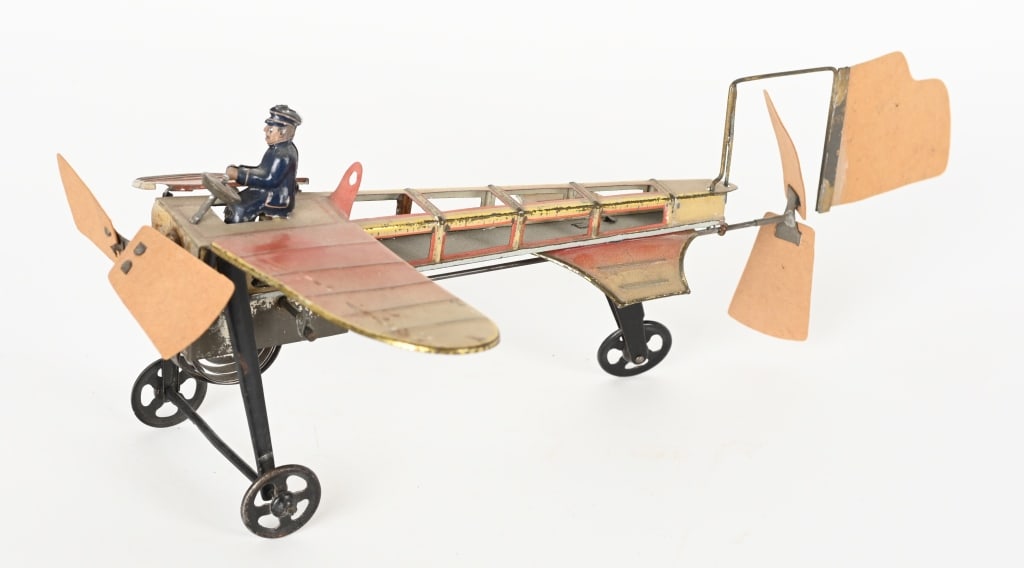 FISHER TIN WINDUP FLAPPING WING AIRPLANE (1 of 6)