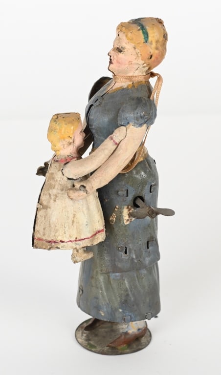 GERMAN TIN WINDUP HAND PAINTED WOMAN & CHILD (1 of 4)