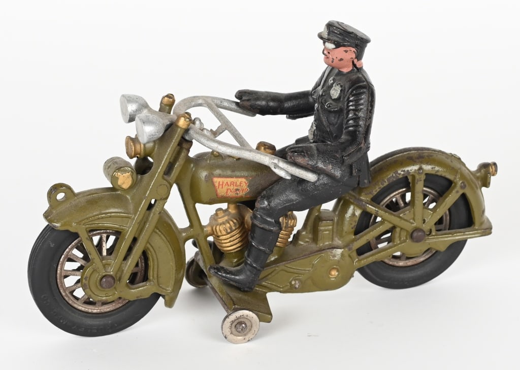 HUBLEY CAST IRON HARLEY DAVIDSON MOTORCYCLE: Hubley cast iron Harley Davidson Motorcycle. All original with very nice paint and decals. No breaks or repairs. Comes with Policeman Rider. 9" Excellent