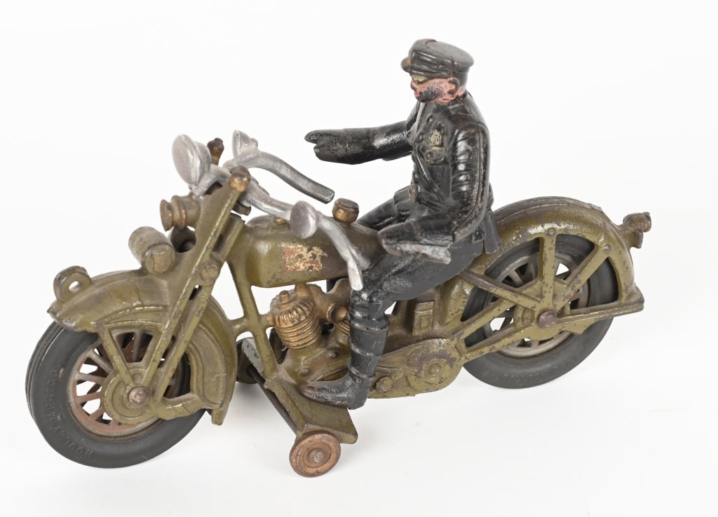 HUBLEY CAST IRON HARLEY DAVIDSON MOTORCYCLE: Hubley cast iron Harley Davidson Motorcycle. All original with very nice paint and decals. No breaks or repairs. Comes with Policeman Rider. 9" Very Good