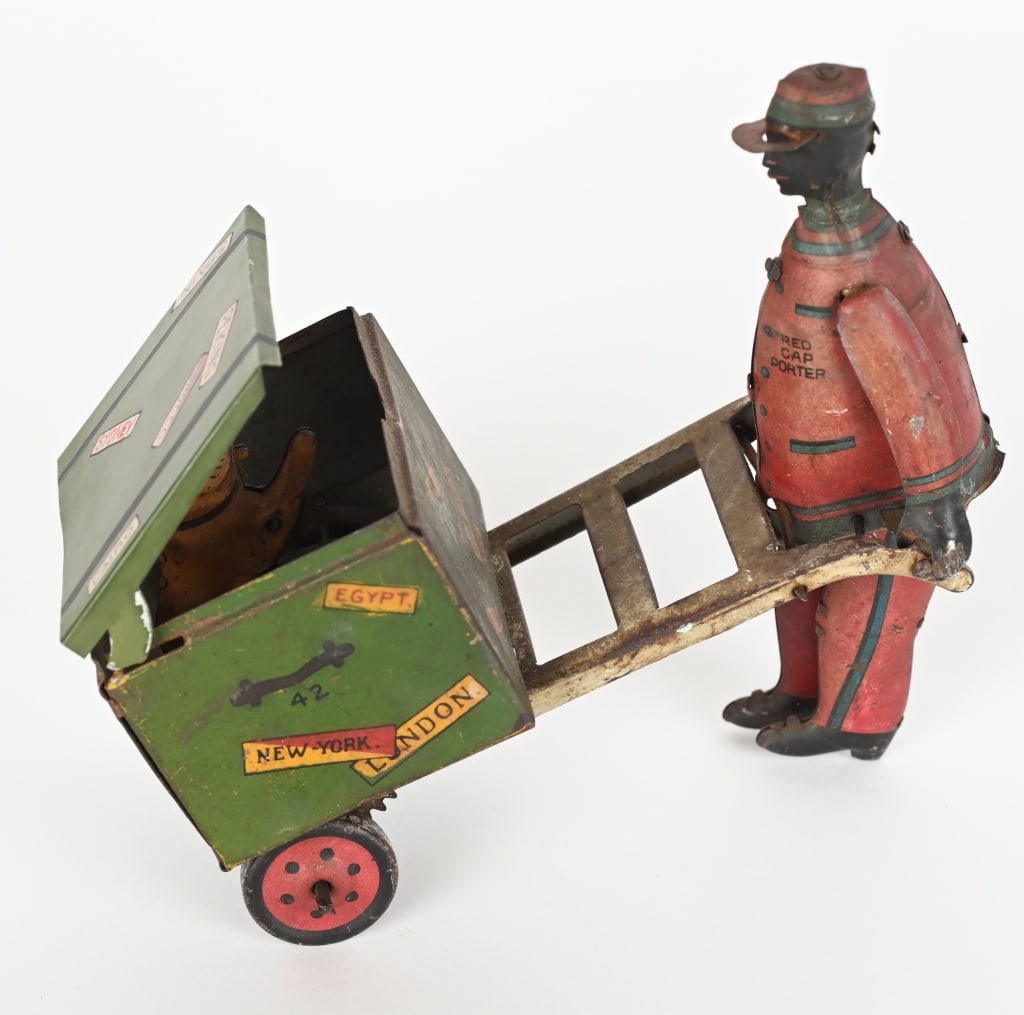 STRAUSS TIN WINDUP PORTER WITH DOG (1 of 4)