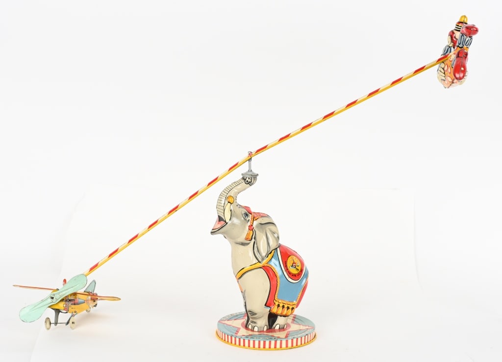 UNIQUE ART TIN WINDUP FLYING CIRCUS (1 of 6)