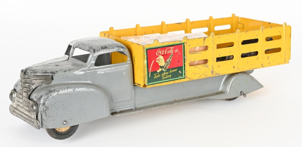 MARX COCA COLA SPRIT BOY DELIVERY TRUCK: Marx Coca Cola Sprit Boy Delivery Truck. All original with some play wear. There is a spacer added to rear axel, and the wheels are loose. Comes with Hand Cart and Coca Cola Cases. 21" Very Good