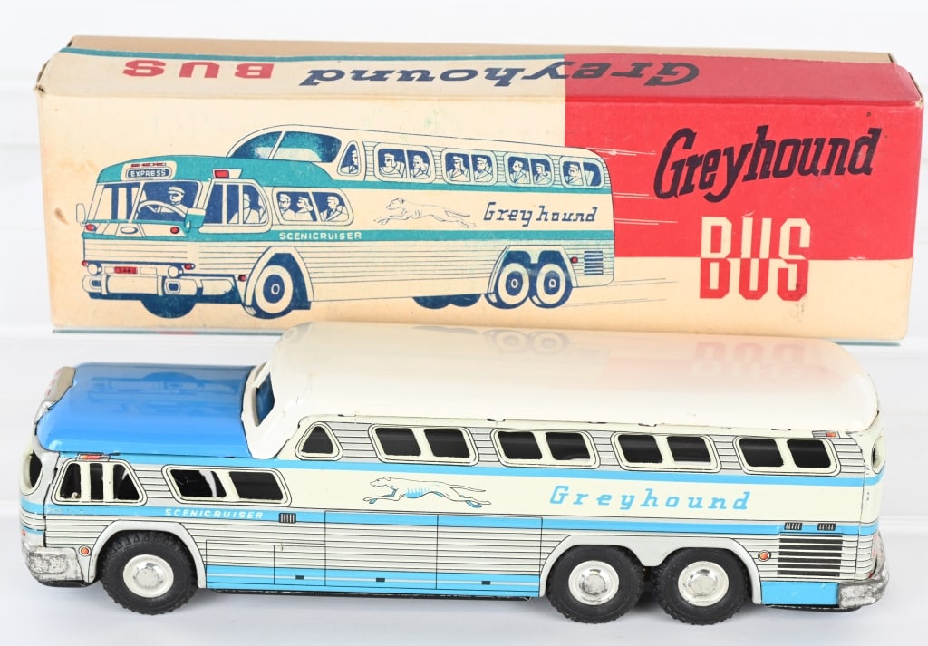 KTS TIN FRICTION GREYHOUND BUS w/ BOX: Japan tin friction Greyhound Bus. All original and looks never played with. friction works. Boxed 11" Excellent