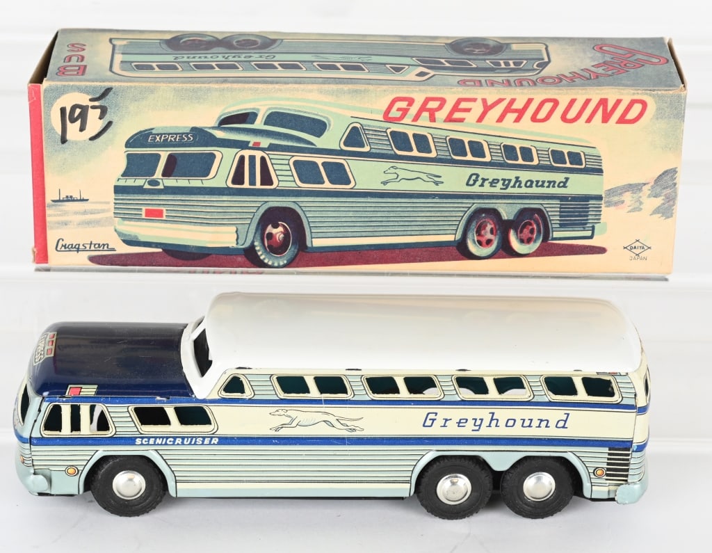 DAIYA TIN FRICTION GREYHOUND BUS w/ BOX: Japan tin friction Greyhound Bus. All original and looks never played with. Friction works. Boxed 7" Excellent