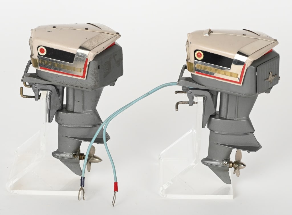 2- EVINRUDE BATTERY OP OUTBOARD BOAT MOTORS: Pair of battery operated Evinrude Outboard Boat Motors. Both in great shape. Largest 5 1/2" Excellent