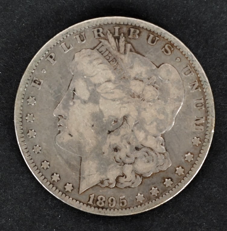 1895-O MORGAN SILVER DOLLAR (1 of 2)