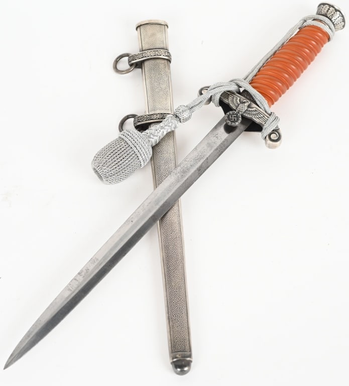 WWII NAZI GERMAN OFFICER DAGGER A. Sch¸ttelhˆfer: Extremely rare maker dagger features a roughly 26cm long drop forged steel construction nickel/silver plated stiletto style blade with a flat central ridge. The blade is in overall excellent condition