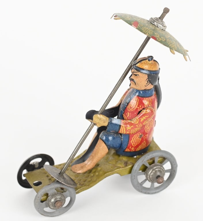 GERMAN TIN PENNY ASIAN MAN w/ PARASOL (1 of 4)