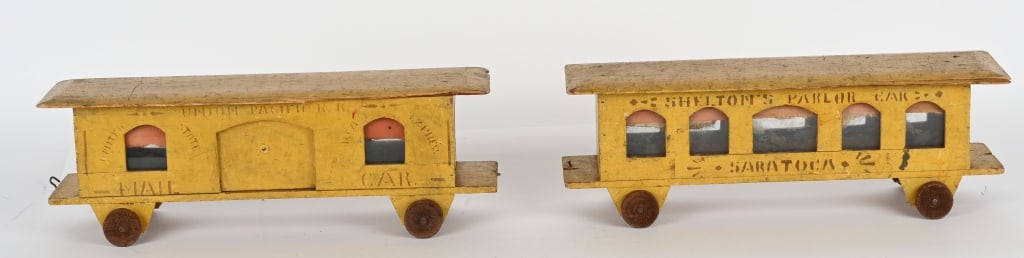 2- EARLY WOODEN TRAIN CARS: Includes Shelton Parlor car Saratoga missing windows on one side and Union Pacific RR US Mail Car. Both all original condition. Have few chips on edges of roof. Nice early toys. 17" Very Good-Excellen