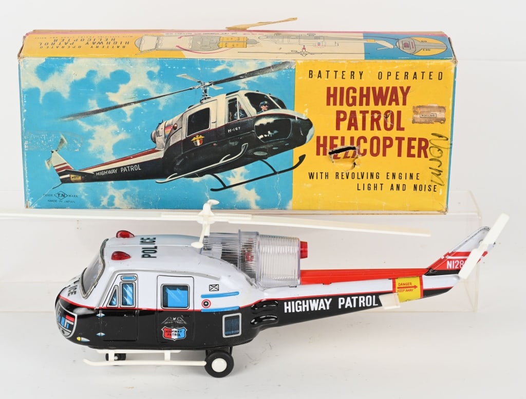 JAPAN TIN BATTERY OP PATROL HELICOPTER w/ BOX: NIce working condition with the original colorful box. The toy is excellent and the box has wear. 14", Excellent, 5752