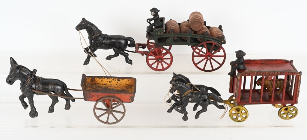 3- CAST IRON ANIMAL DRAWN WAGONS (1 of 4)