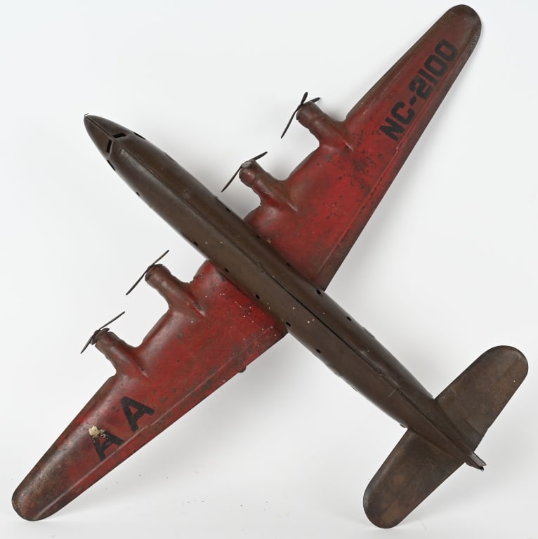 MARX PRESSED STEEL AA FLAGSHIP AIRPLANE: Original Marx pressed steel AA Flagship airplane. Original paint and decals and appears to be varnished. There are screws holding the wing on. 28" WS very Good