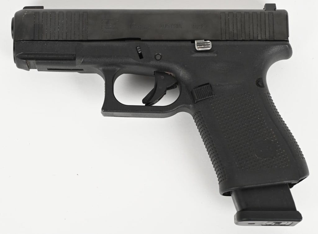 GLOCK MODEL 19 GEN 5 SEMI AUTOMATIC PISTOL: SERIAL NUMBER: BPXB338. BARREL: 4". CALIBER: 9MM LUGER. MANUFACTURED: 2020's. Made in Austria. Standard markings and features. Tru Dot sights, black nitride finished slide and black polymer frame. Inc