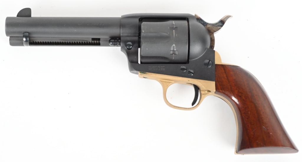 ITALIAN UBERTI SAA REVOLVER IN .45 COLT: SERIAL NUMBER: J06744. BARREL: 4-3/4". CALIBER: .45 COLT. MANUFACTURED: 2001. Made in Italy and imported by Cabellas. Six shot fluted cylinder. Blade front sight and u-notch rear. Matte blued finish, 