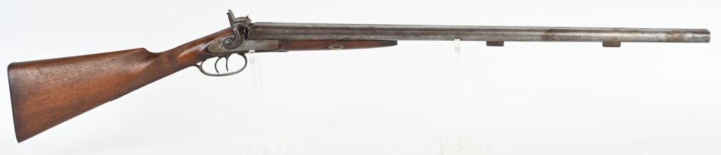 ANTIQUE PERCUSSION SXS SHOTGUN.: BARRELS 30". GAUGE 12. Exposed hammers, checkered stock. double triggers. Condition. Checkering looks newer and crisp. Metal is patina. No rod. Right hammer not working. Sold as decoration or parts on