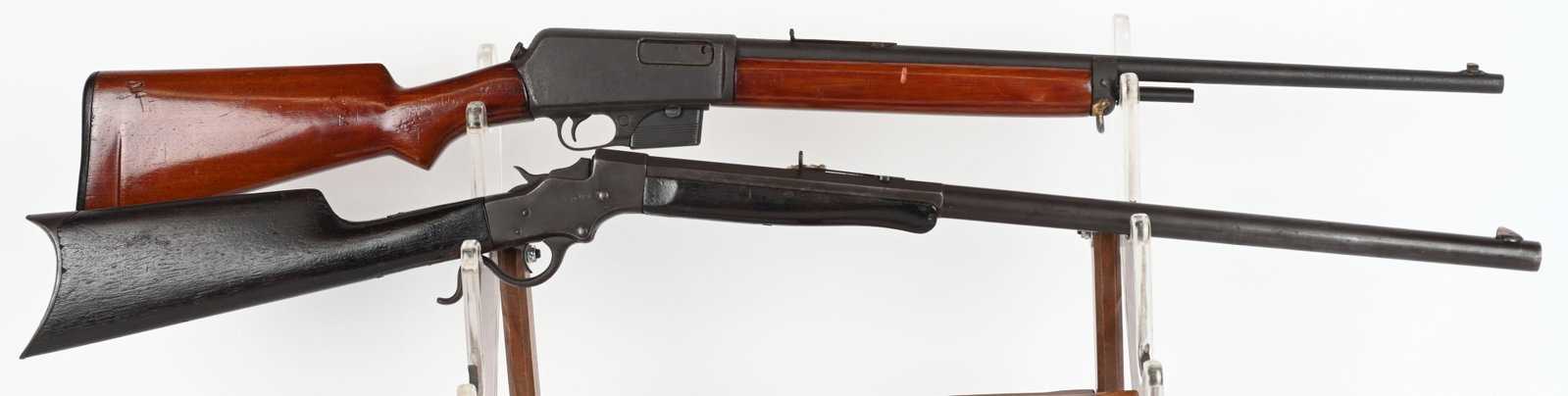 LOT (2) STEVENS & WINCHESTER PARTS OR RESTORE: A. STEVENS 44. SERIAL 8244. BARREL 26". CALIBER 32 LONG RF. Octagon to round barrel, rifle butt plate, walnut stocks, sporting sights. Metal dark brown. Legends are sharp. Wood excellent but heat chec