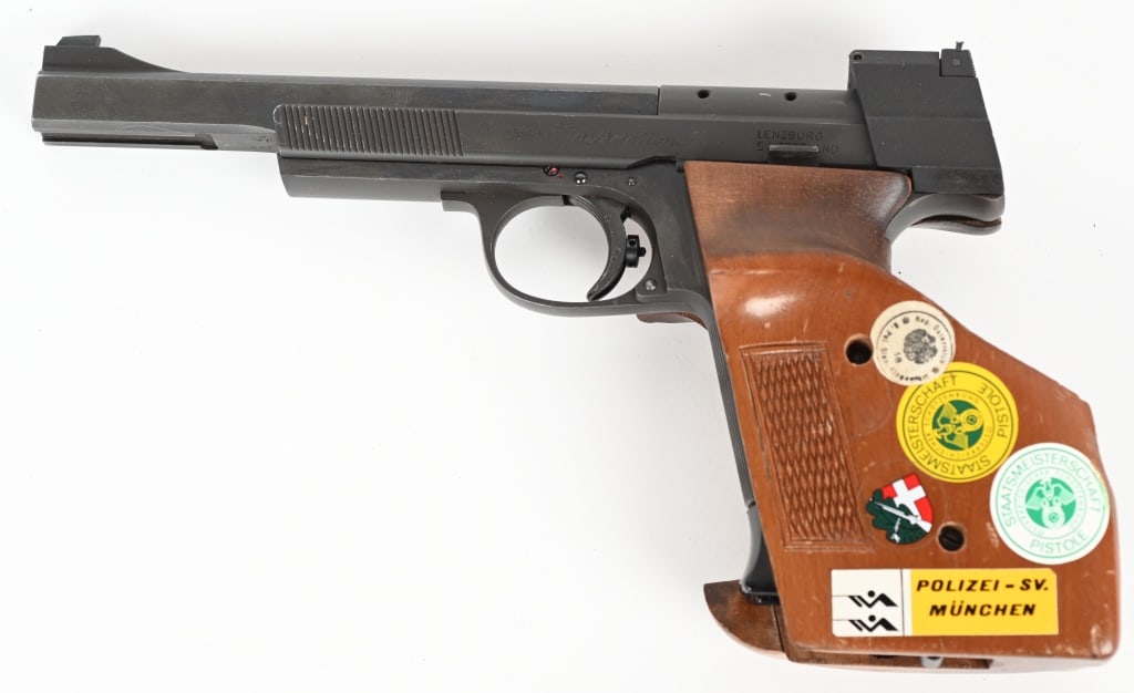 HAMMERLI 208 INTRENATIONAL TARGET PISTOL: SERIAL NUMBER:G27098 BARREL: 5 7/8" CALIBER: 22 Lr MANUFACTURED: LENZBURG SWITZERLAND Has blued steel frame, barrel, and slide. Target sights bore is bright with strong rifling. One factory magazine a