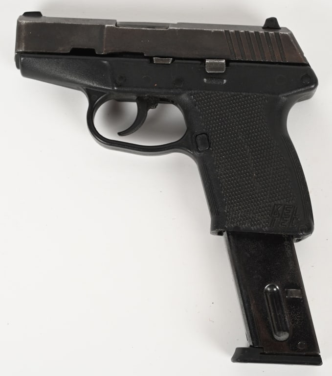 KEL-TEC P-11 SEMI AUTOMATIC PISTOL: SERIAL NUMBER: A6N00 BARREL: 3" CALIBER: 9MM LUGER. Black polymer frame with KEL-TEC logo on both sides. Blued steel slide with freckling and barrel has good bore strong rifling. One 20 round extended