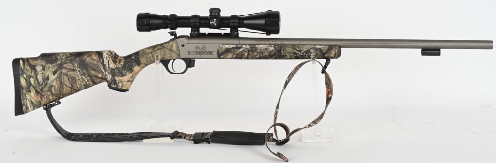 TRADITIONS NITROFIRE INLINE MUZZLE LOADER RIFLE: SERIAL NUMBER: 14-13-033335-23. BARREL: 26". CALIBER: .50 PERCUSSION. MANUFACTURED: 2010S. Made in Spain by Ardesa. No iron sights. Matte stainless finish. Camo polymer stock and forearm with thick ru