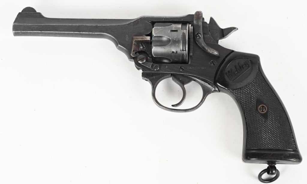1943 WEBLEY & SCOTT MARK IV DA REVOLVER .38 S&W: SERIAL NUMBER: 91997. BARREL: 5". CALIBER; .38 S&W. MANUFACTURED: 1943. "WAR FINISH" marked. No import marks found. Matching serials on the frame, barrel assembly and six cylinder. Blade front sight, 