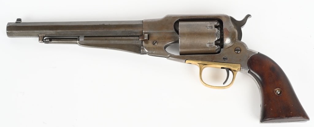 MARTIAL REMINGTON MODEL 1858 PERCUSSION REVOLVER: SERIAL 137373. BARREL 8". CALIBER 44. Martial inspected. Serial number is hard to read. Features octagon barrel, two piece walnut grips, brass trigger guard. Condition. Has wiped on finish, grips shy 