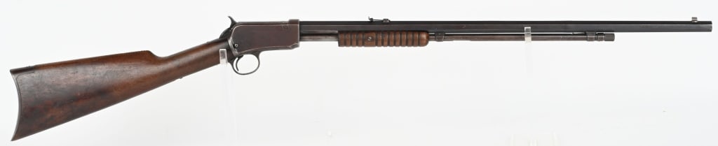 WINCHESTER MODEL 90 PUMP ACTION RIFLE IN .22LR: SERIAL NUMBER: 668392. BARREL: 24". CALIBER: .22LR. MANUFACTURED: 1924. Takdown model with matching serials. Standard markings and Winchester proofs. Octagon barrel, with factory blade front sight and