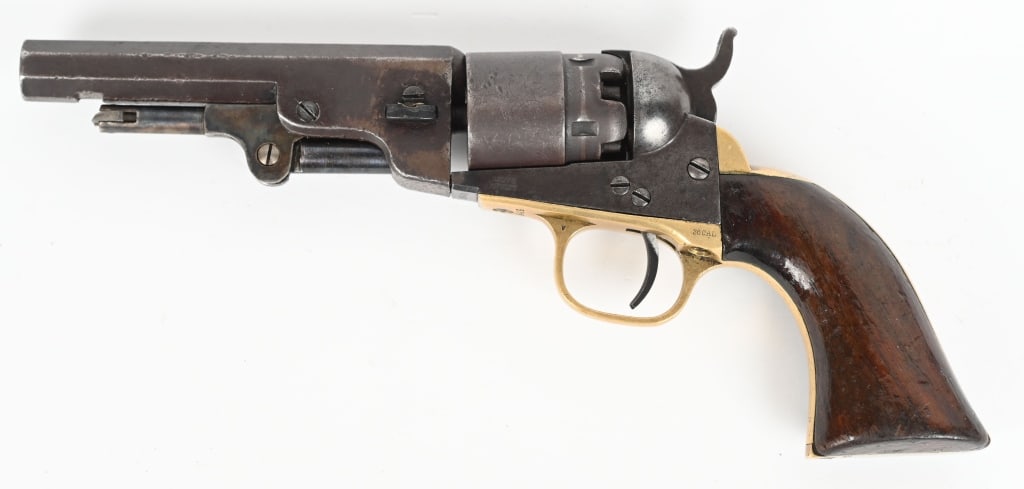 COLT MODEL 1862 POCKET NAVY REVOLVER: SERIAL 16449. BARREL 4.5" CALIBER 36. All matching numbers but wedge and loading lever are replacements. No lever catch under barrel. 5-shot, single action, rebated cylinder with roll die stage coach 