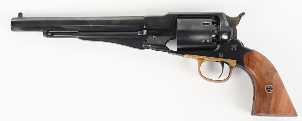1858 REMINGTON REVOLVER MADE BY A.UBERTI: SERIAL NUMBER: 109927 BARREL: 7 7/8" CALIBER: 44 RB. Black powder revolver made by A. Uberti in Italy . Blued frame and barrel that show signs of wear from use. Barrel has shiny bore and chambers with