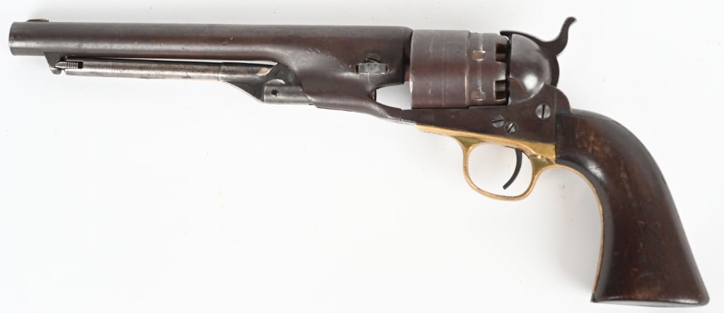 COLT MODEL 1860 ARMY SINGLE ACTION ARMY: SERIAL NUMBER: 130765. BARREL: 8". CALIBER: .44 BLACK POWDER PERCUSSION. MANUFACTURED: 1863. Likely Civil War used, with faint military inspector stamp on the bottom left side of the grip. Barrel has 