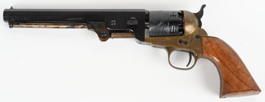FIE ITALY 1851 COLT NAVY SINGLE ACTION REVOLVER: SERIAL NUMBER:8350 BARREL: 7 1/2" CALIBER: 36 Black Powder made in Italy 6 shot percussion cap. Brass frame with Blued Barrel and Cylinder with engraved ship scene with smooth wooden grips. Barrel has