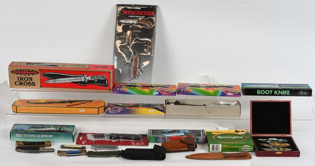 LOT OF FIXED AND FOLDING BLADE KNIVES: Includes: 10 various fixed blade knives 12 various folding pocket knives Winchester 4 piece folding knife set Set of Remington playing cards CONDITION: All are very good overall, or better, with some 