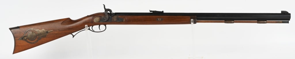 ITALIAN INVESTARM .50 CALIBER PERCUSSION RIFLE: SERIAL NUMBER: 147256. BARREL: 28". CALIBER: .50 CALIBER PERCUSSION. MANUFACTURED: 1981. Hawken style rifle, with full octagon barrel. Double set triggers. Blade front sight and adjustable u-notch rea