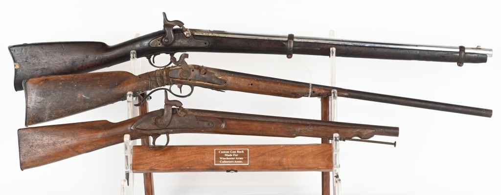 LOT OF 3: CUT DOWN PERCUSSION PIECES: A. Cut down 1861 William Muir contract musket. SERIAL NUMBER: NSN. BARREL: 28". CALIBER: .58 CALIBER PERCUSSION. MANUFACTURED: 1863. Lock plate is dated "1863", with faint markings. Barrel cut down an