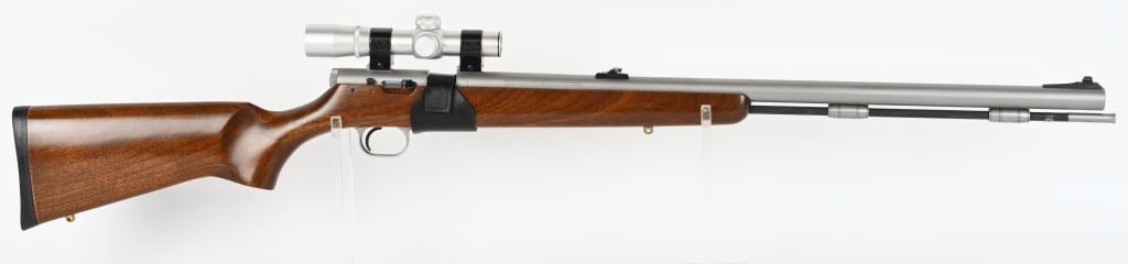 THOMPSON CENTER ARMS FIRE HAWK INLINE RIFLE: SERIAL NUMBER: S22187. BARREL: 24". CALIBER: .50 CALIBER BLACKPOWDER. MANUFACTURED: 1980S/90S. Uses percussion caps. Ramped blade front sight, with flip up u-notch rear. Stainless finish and oiled woo