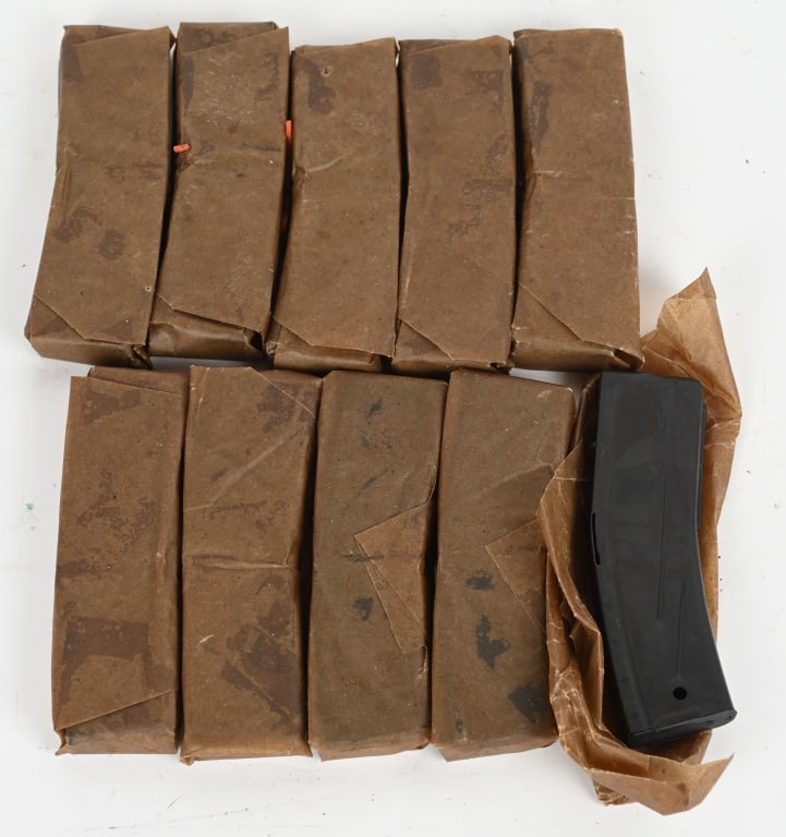 LOT OF 10 WRAPPED 30 ROUND M1 CARBINE MAGS: All are wrapped in factory wax paper. The example that was unwrapped to check for markings is unmarked. CONDITION: New old stock. JWA