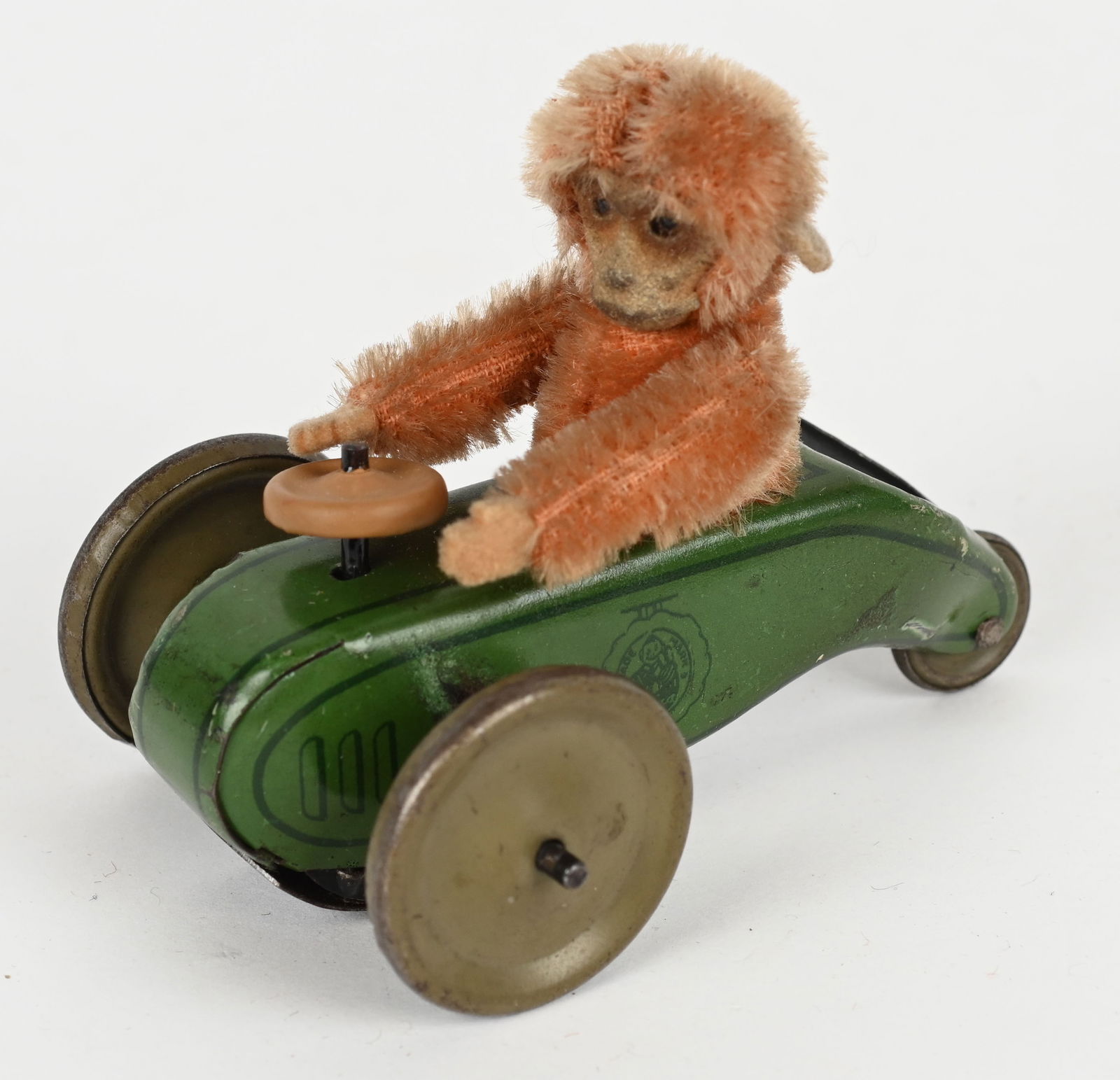 SCHUCO FRICTION MONKEY SEATED ON SCOOTER (1 of 5)