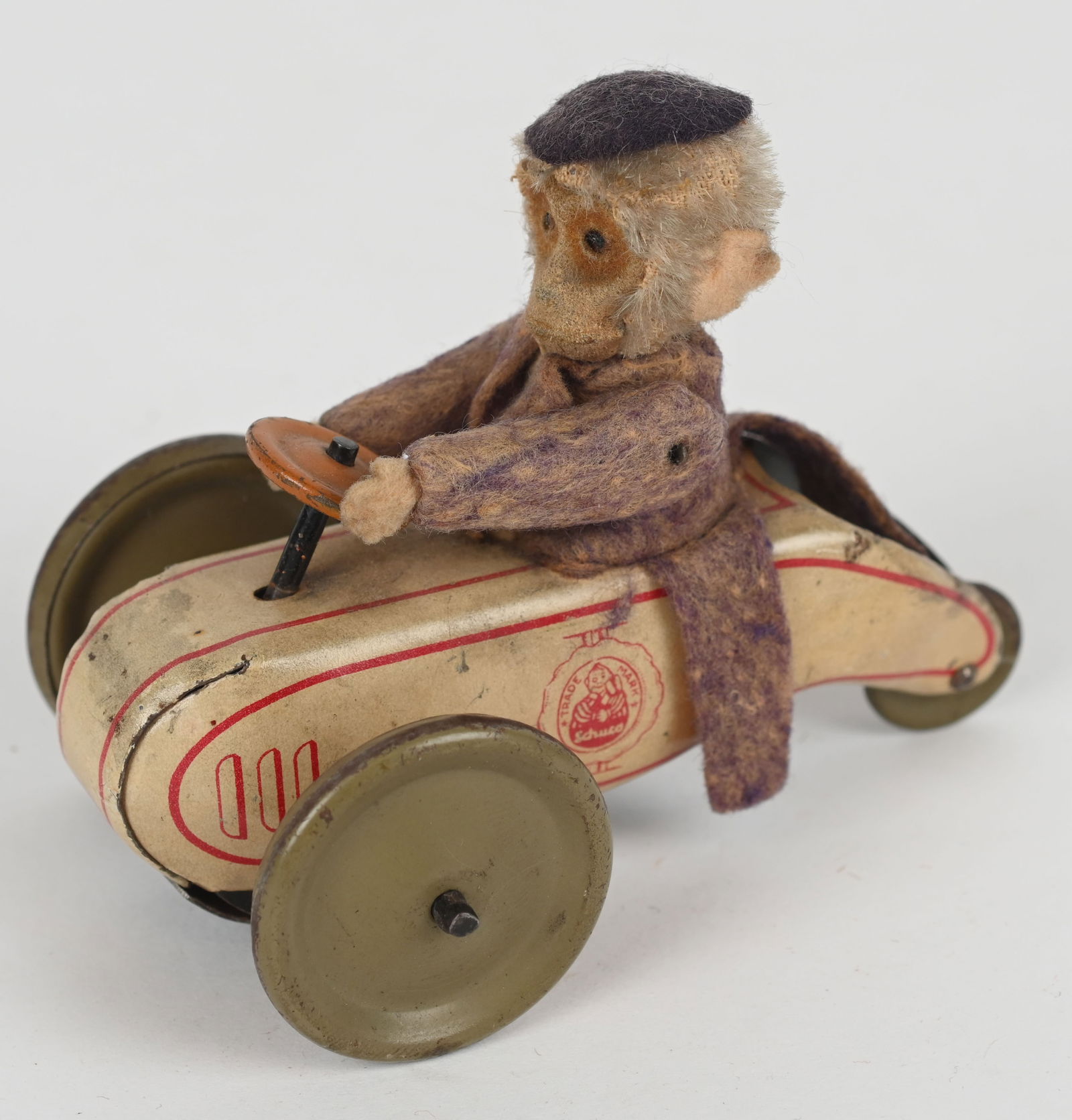 SCHUCO FRICTION MONKEY SEATED ON SCOOTER (1 of 5)