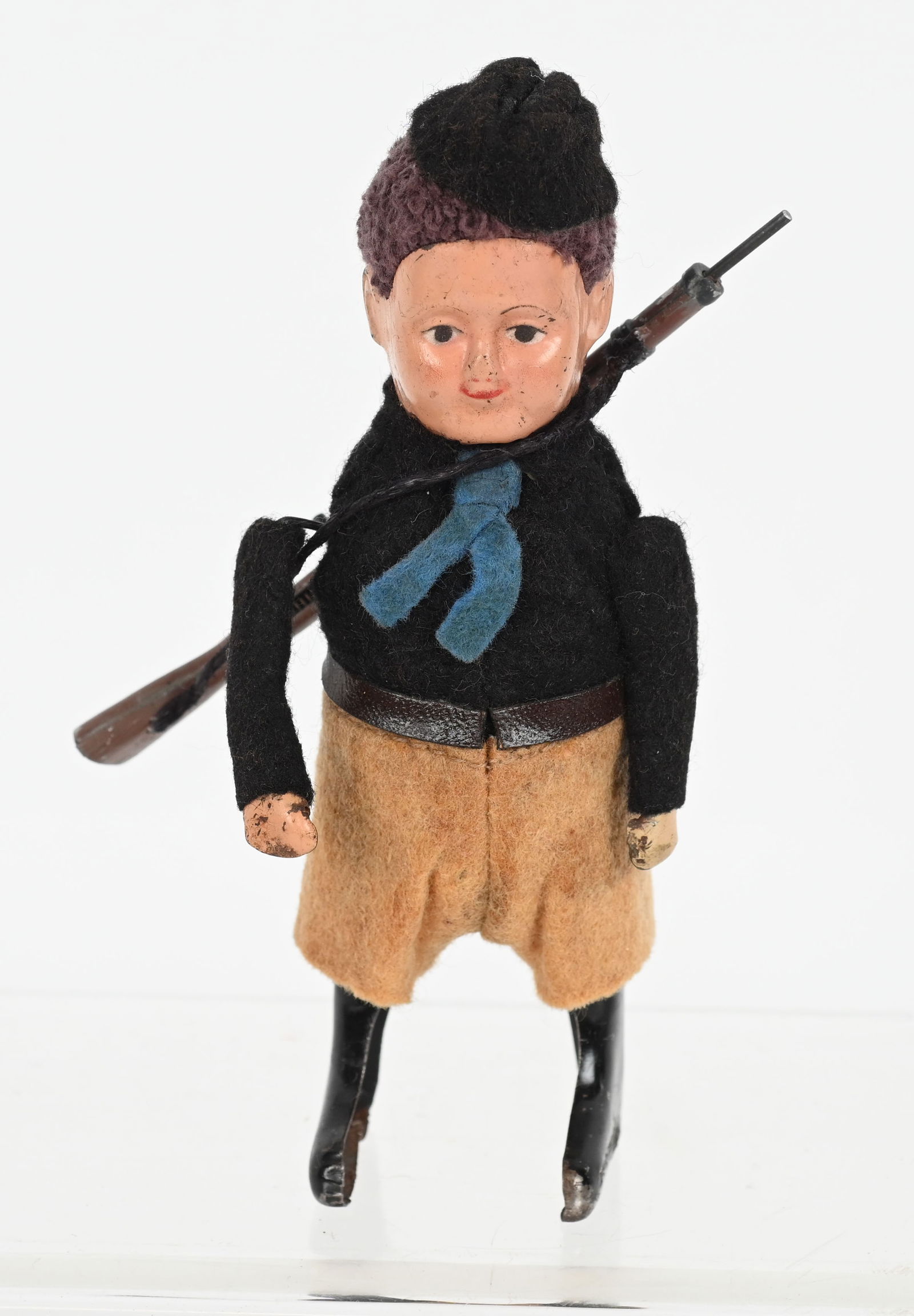 SCHUCO WINDUP FASCIST SOLDIER w/ RIFLE: Scarce Fascist Soldier with Rifle. All original in great shape. Has original tag. Windup works. 5" Excellent