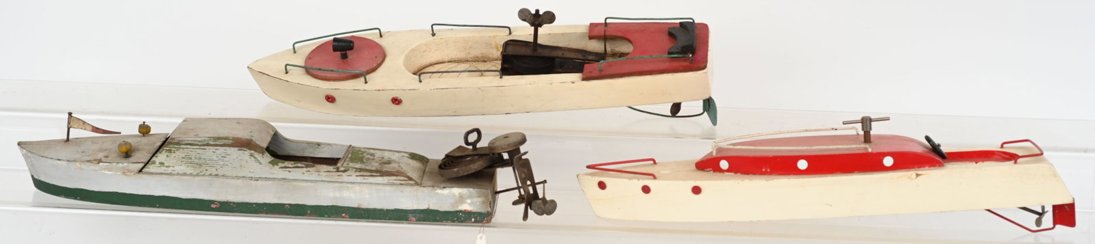 3- VINTAGE WINDUP WOODEN BOATS: All in original condition. One 1 working. 18" AS-IS