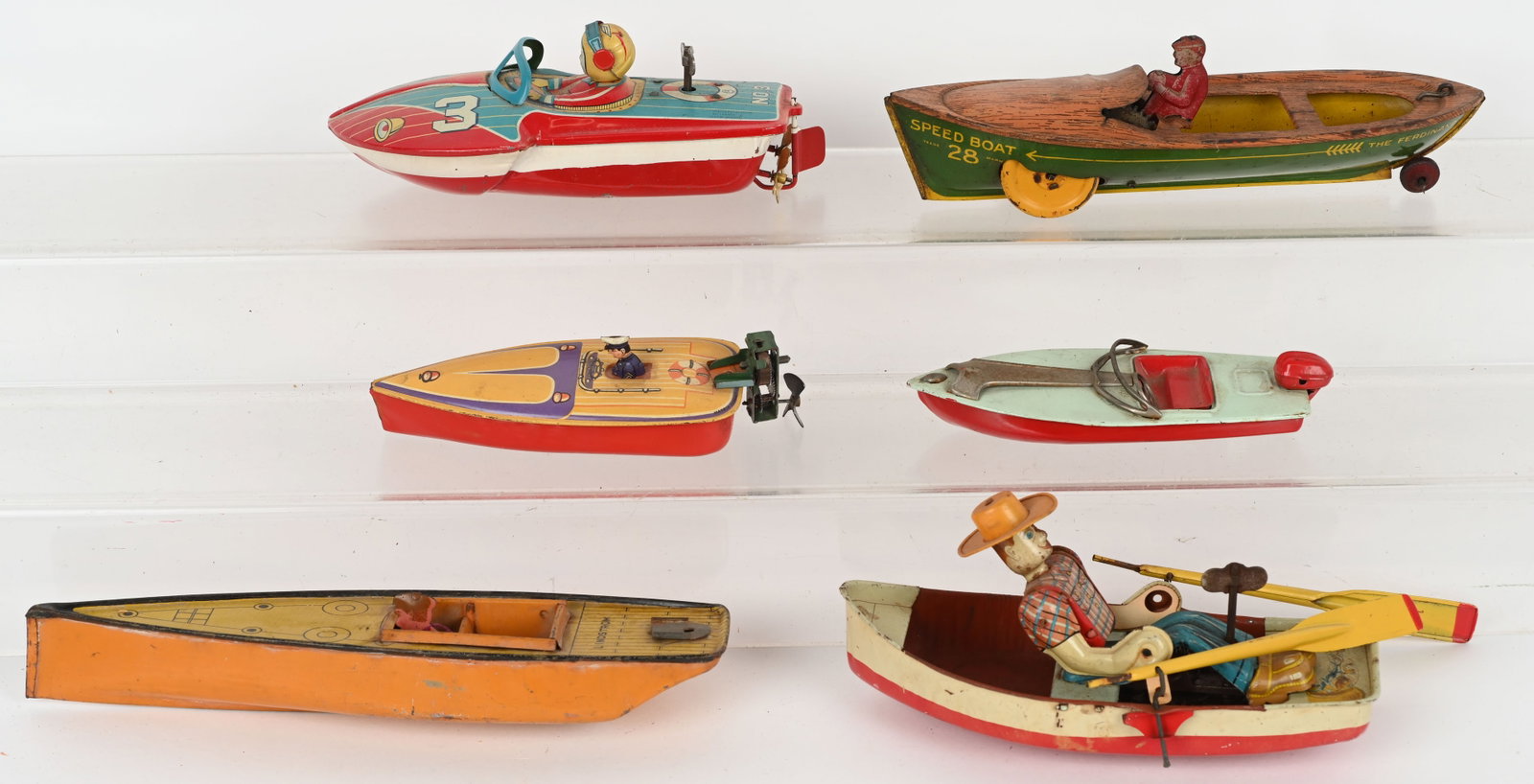 LOT OF VINTAGE TIN BOATS: Lot of tin boats many with windups. Conditions vary. Largest 10" AS-IS