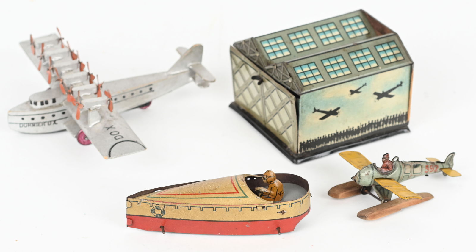 GERMAN PENNY TOY SPEEDBOAT & AIRPLANE HANGAR (1 of 7)