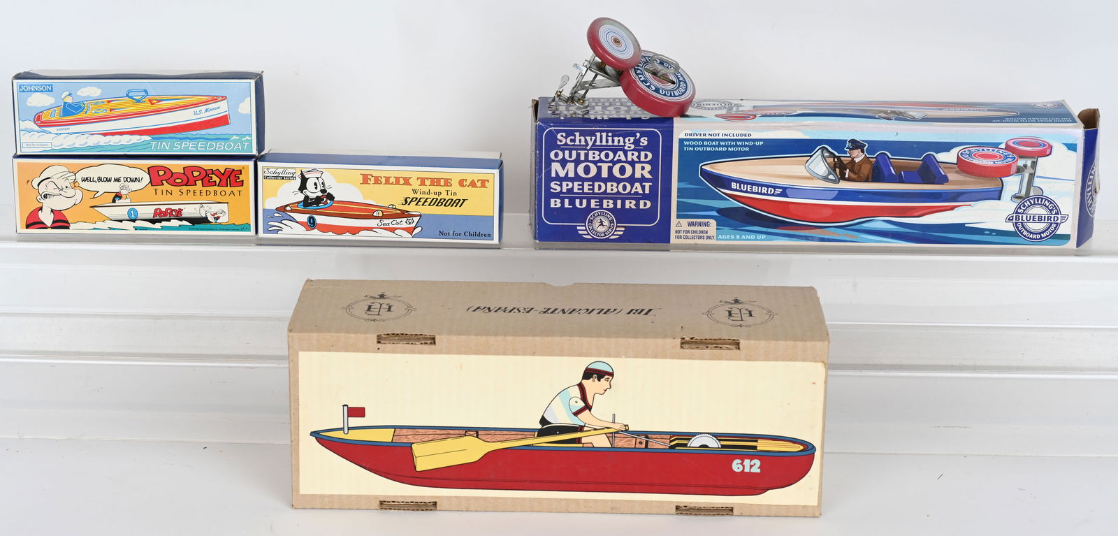 5- TIN TOY BOATS w/ BOXES: Lot of contemporary tin boats with boxes. Condition varies. Largest is 16" AS-IS